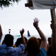 Onlookers wave at Greta Thunberg arriving in New York Harbor.